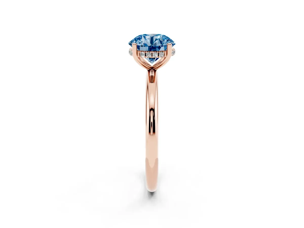 Fancy Blue Round Cut Cut Solitaire Engagement Ring with Four-Prong Setting and Classic Band Rose gold