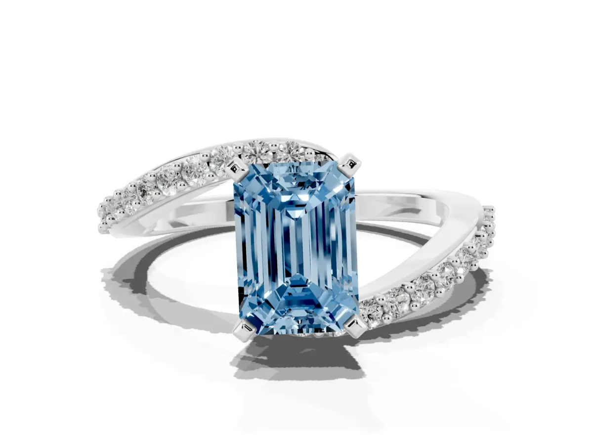 Fancy Blue Emerald Cut Solitaire Twist Band with Pave Set Diamonds and Four-Prong Setting Platinum