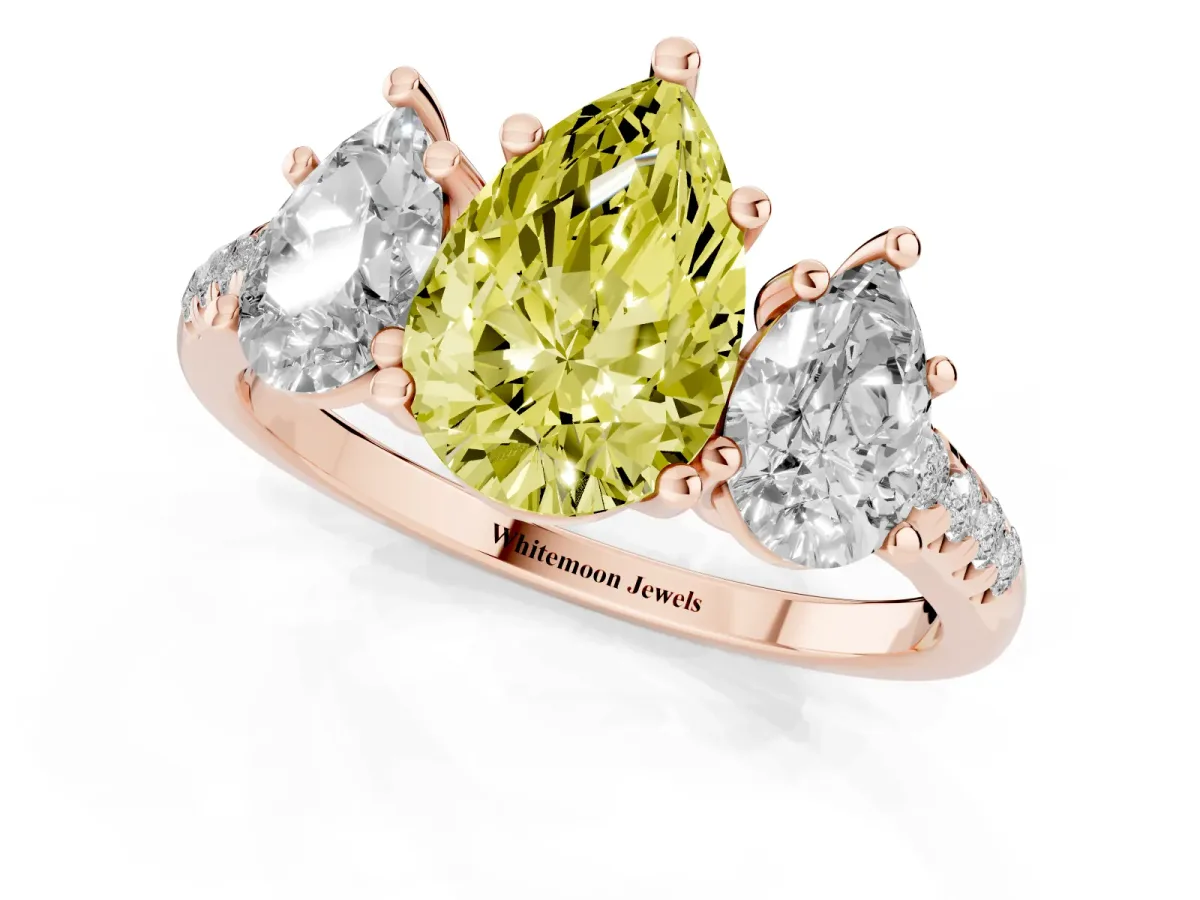 Fancy Yellow Three-Stone Pear Cut Diamond Ring with Round Pavé Band and Prong Setting Rose gold