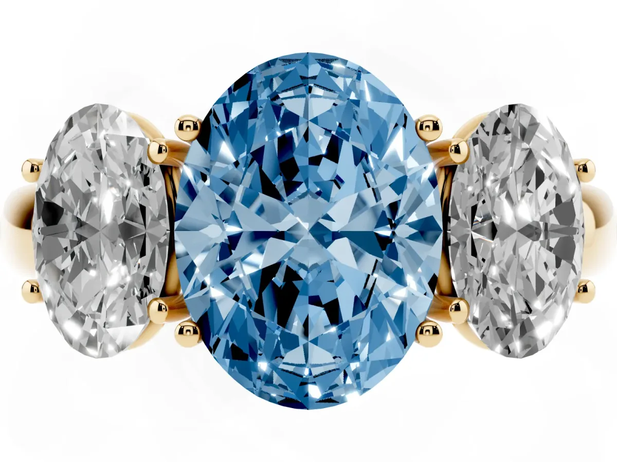 Fancy Blue Oval Cut Diamond Three-Stone Ring with Four-Prong Setting and Classic Band Yellow gold