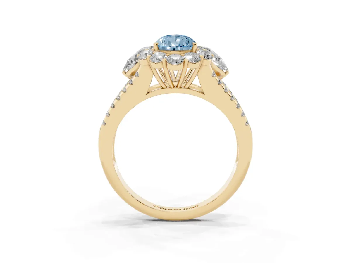 Fancy Blue Pear Cut Halo Split Shank Diamond Engagement Ring with Prong Setting Yellow gold