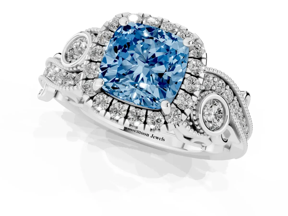 Fancy Blue Cushion Cut Halo Diamond Ring with Milgrain and Bezel Accents on a Split Shank Band White gold