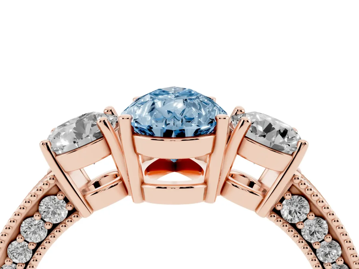 Fancy Blue Pear Cut Three-Stone Diamond Ring with Pavé Band and Four-Prong Setting Rose gold