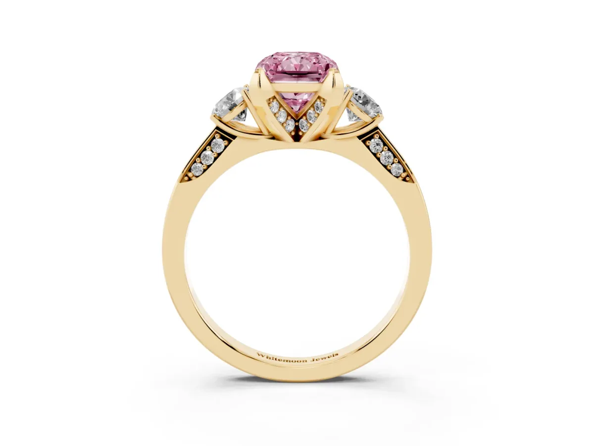Fancy Pink Radiant Cut Brilliant Three-Stone Diamond Ring with Pavé Band and Four-Prong Setting Yellow gold