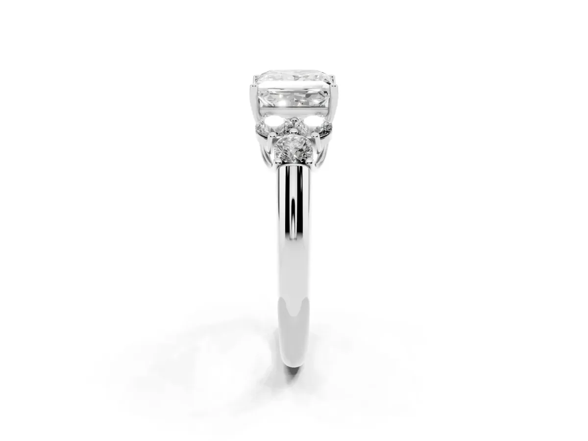 Princess Cut Cut Diamond Cluster Ring with Round Accent Stones and Prong Setting on a Classic Band White gold
