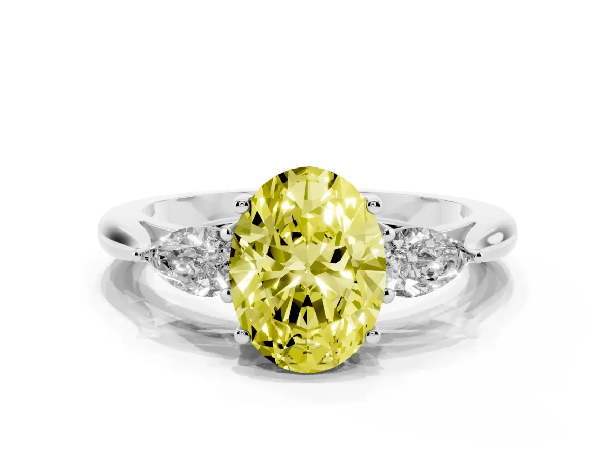 Fancy Yellow Three-Stone Oval Cut Brilliant Diamond Solitaire Ring with Tapered Band and Four-Prong Setting Silver