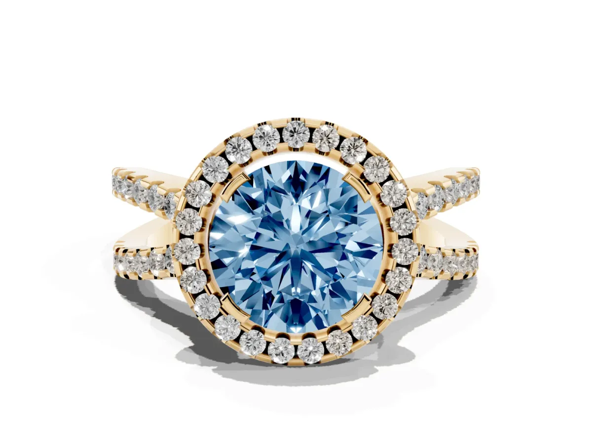 Fancy Blue Round Cut Diamond Halo Ring with Split Shank Pavé Band and Prong Setting Yellow gold