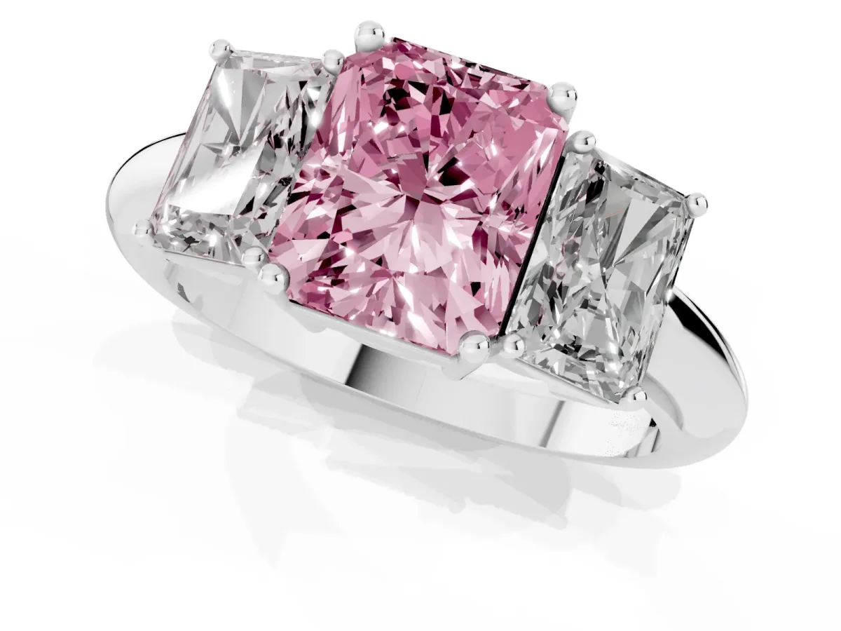 Fancy Pink Three-Stone Radiant Cut Cut Diamond Engagement Ring with Prong Setting on a White Gold Band Platinum