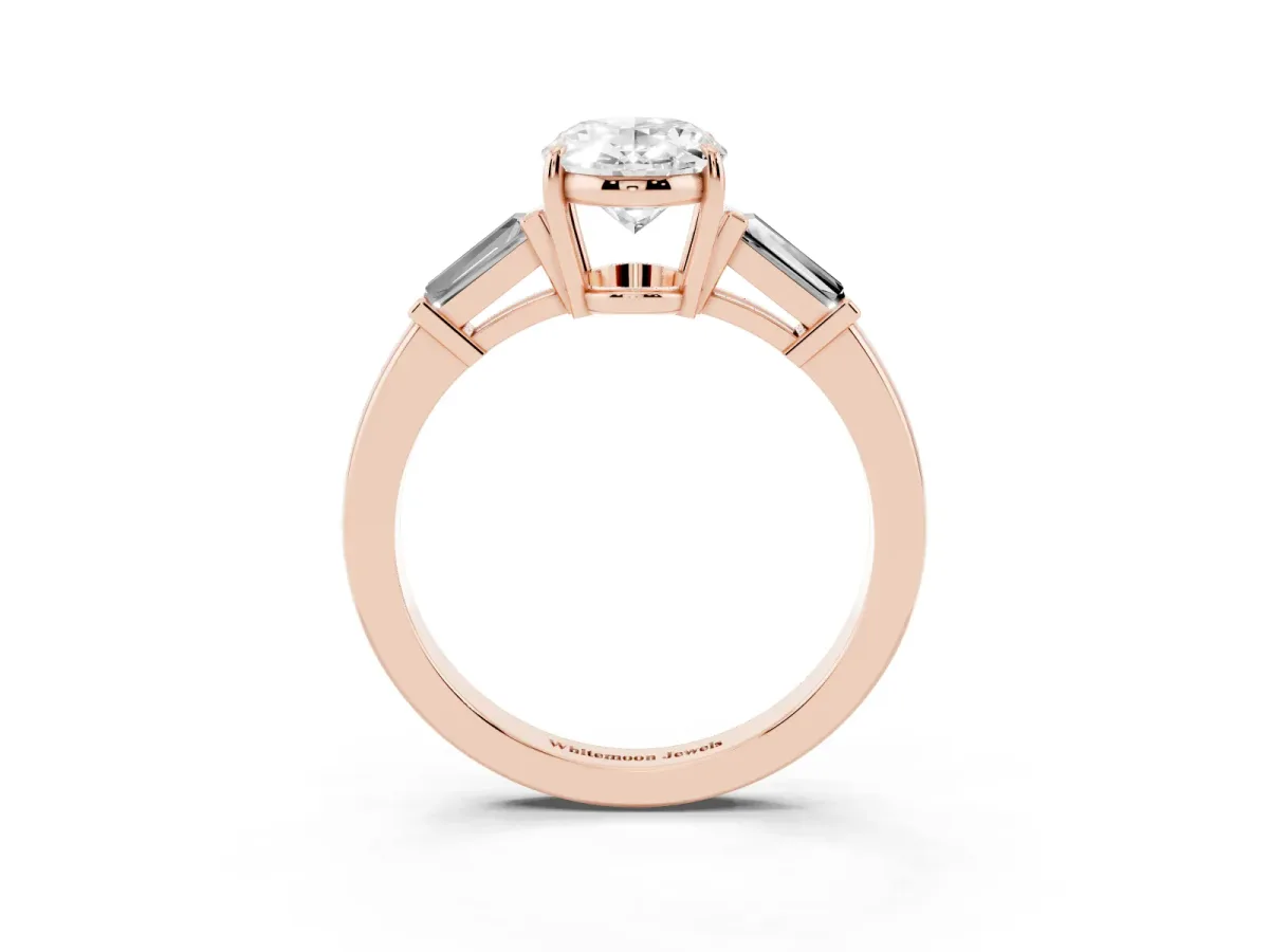 Oval Cut Diamond Three-Stone Ring with Tapered Baguette Side Stones and Prong Setting Rose gold