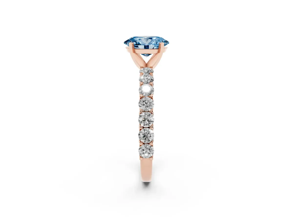 Fancy Blue Oval Cut Diamond Solitaire Ring with Shared Prong Pavé Band and Four-Prong Setting Rose gold