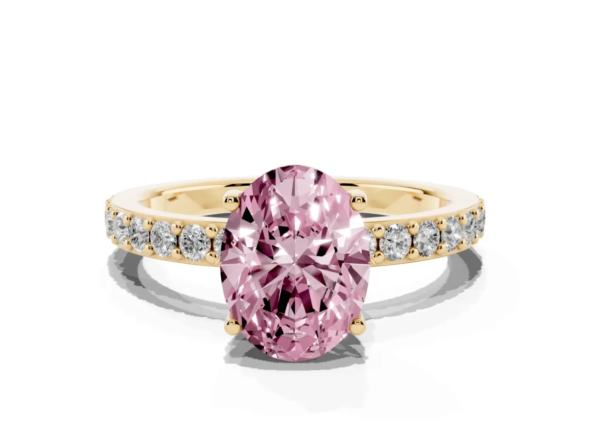 Fancy Pink Oval Cut Cut Diamond Solitaire with Pave Band and Four-Prong Setting Yellow gold