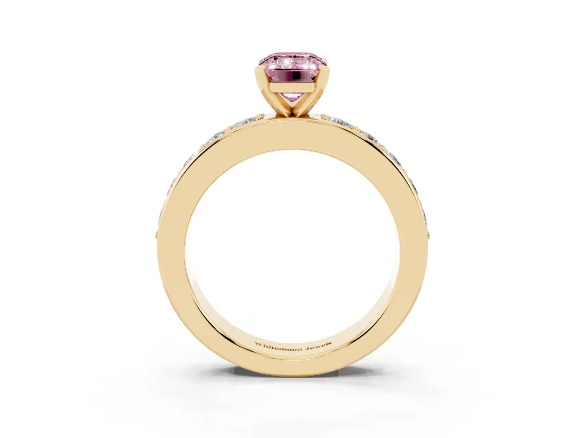 Fancy Pink Emerald Cut Diamond Engagement Ring with Channel Set Round Band and Prong Setting Yellow gold