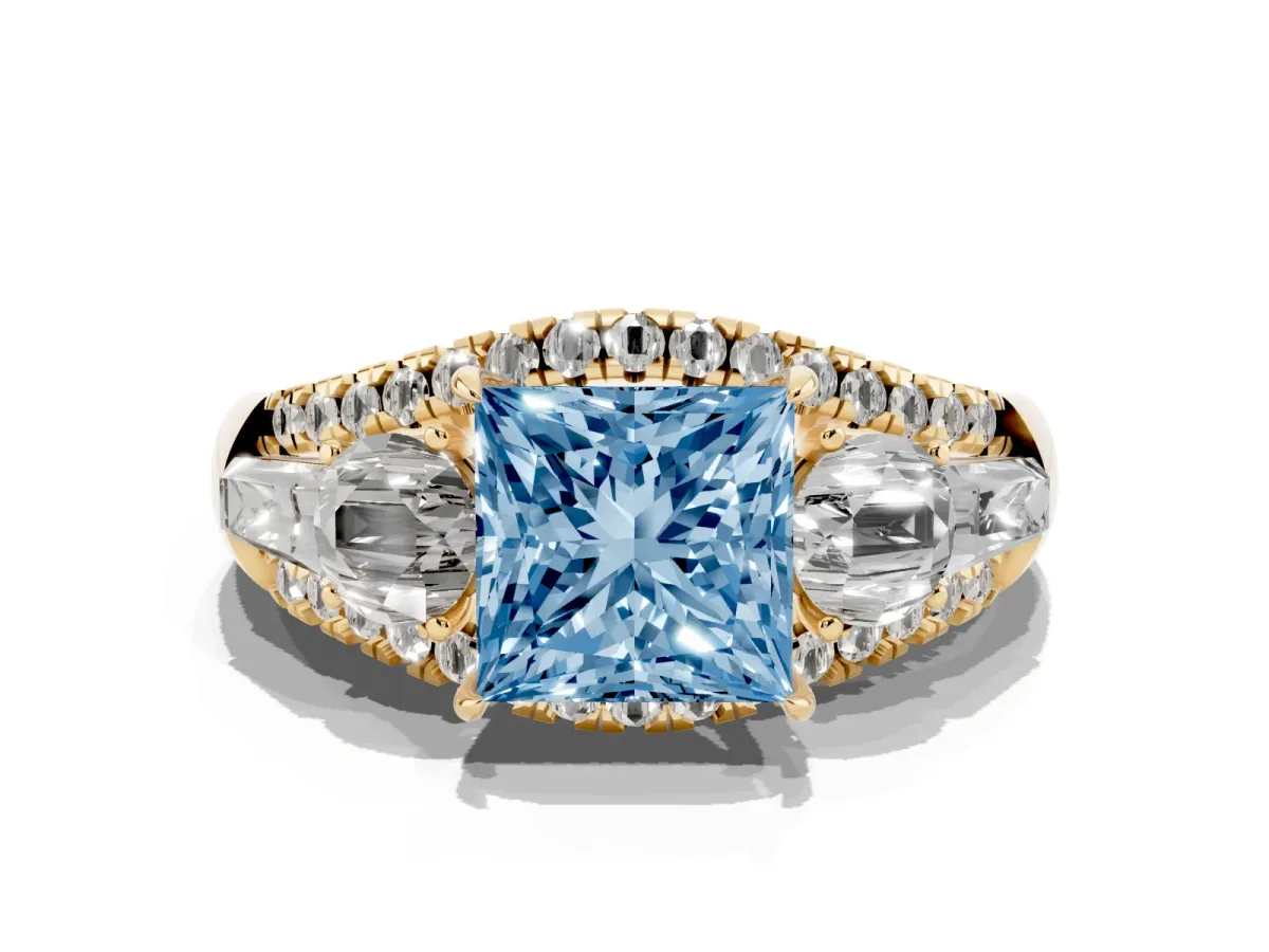 Fancy Blue Three-Stone Princess Cut Diamond Engagement Ring with Pave Band and Prong Setting Yellow gold