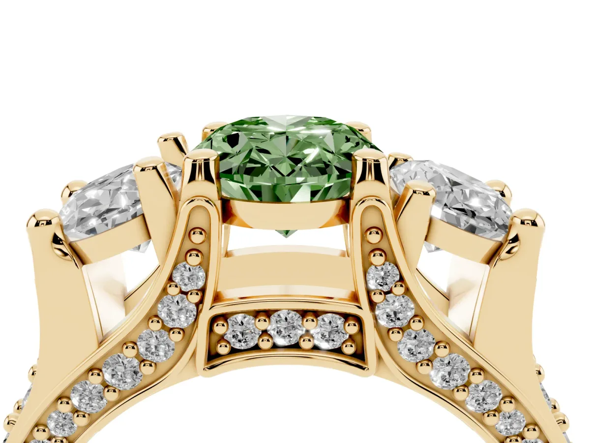 Fancy Green Oval Cut Diamond Three-Stone Ring with Channel Set Band and Four-Prong Setting Yellow gold