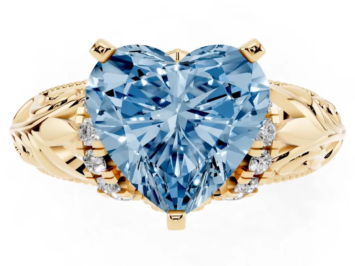 Fancy Blue Heart Cut Solitaire Filigree Engagement Ring with Halo and Prong Setting Yellow gold