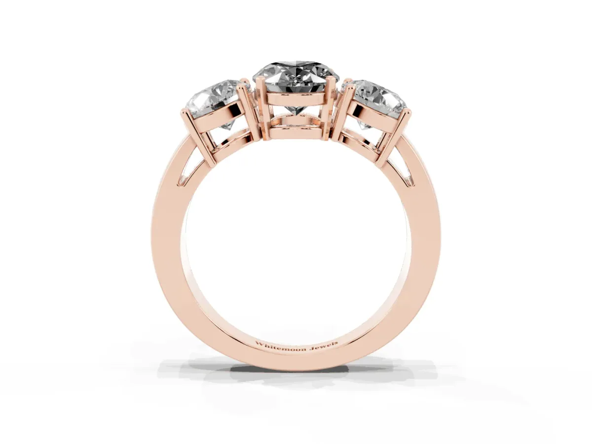 Fancy Black Three-Stone Oval Cut Diamond Ring with Round Side Stones, Classic Band, and Four-Prong Setting Rose gold