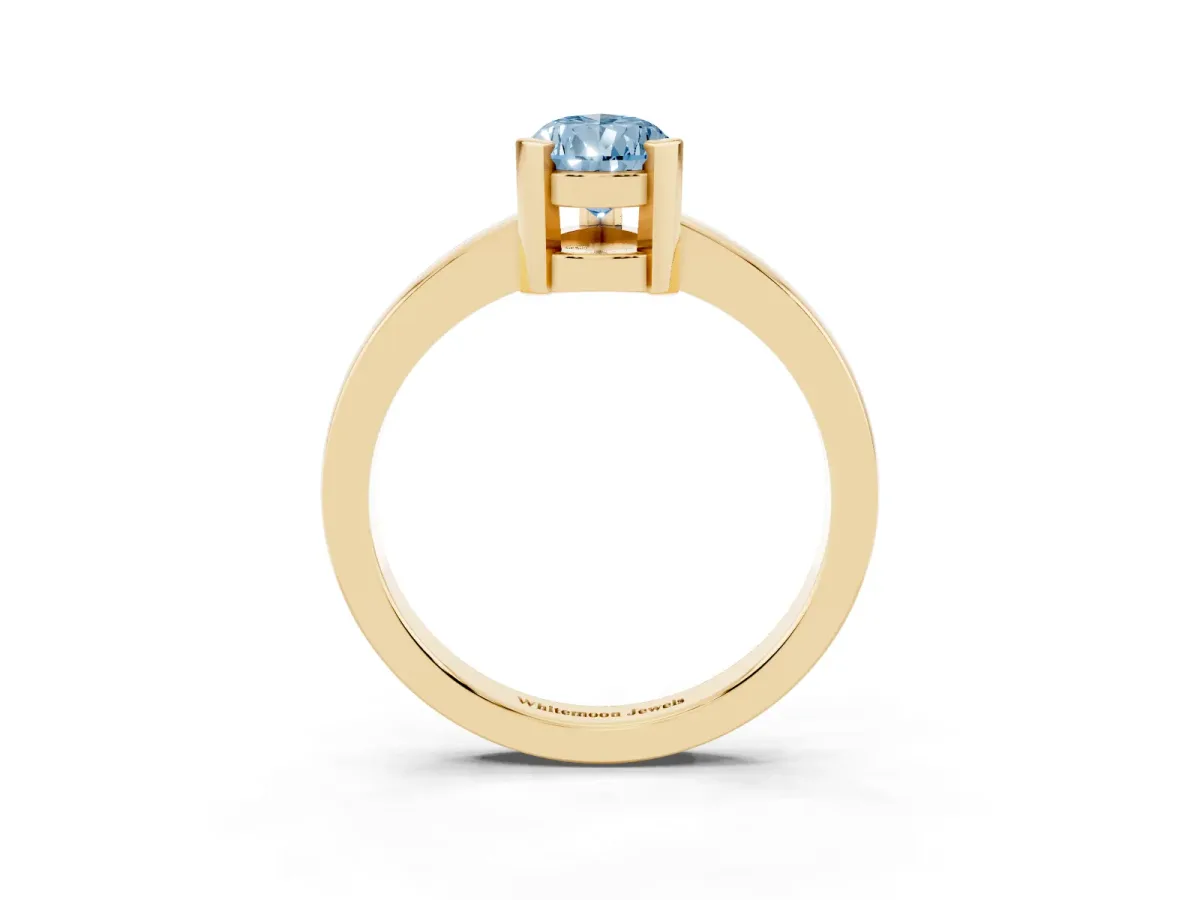 Fancy Blue Pear Cut Cut Solitaire Ring with Four-Prong Setting and Classic Band Yellow gold