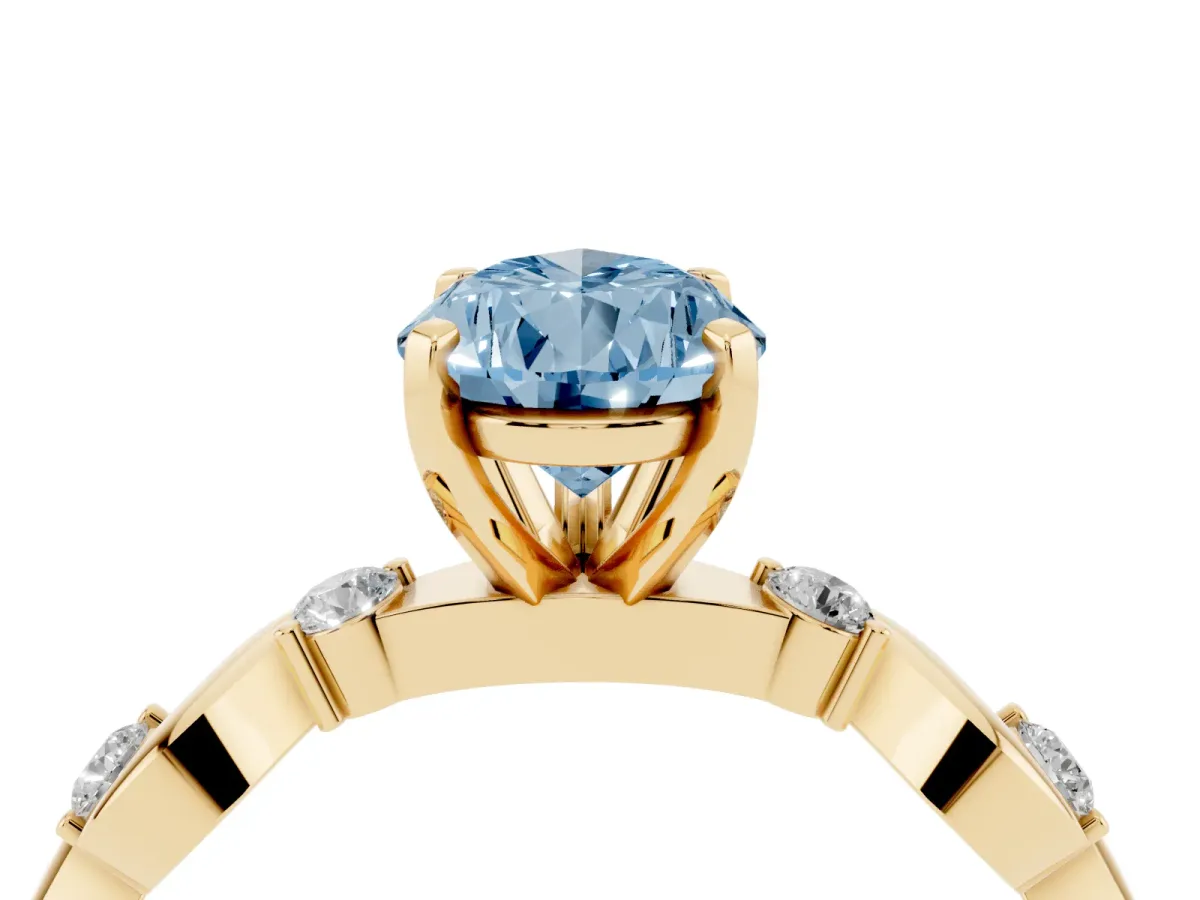 Fancy Blue Pear Cut Diamond Solitaire Twisted Band with Round Accents and Prong Setting Yellow gold