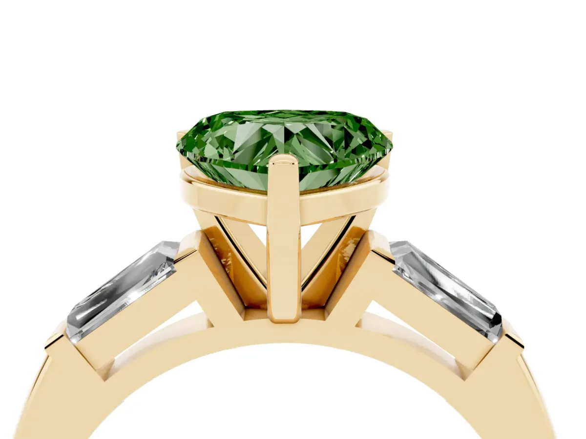 Fancy Green Heart Cut Solitaire with Tapered Baguette Side Stones on a Classic Band with Four-Prong Setting Yellow gold