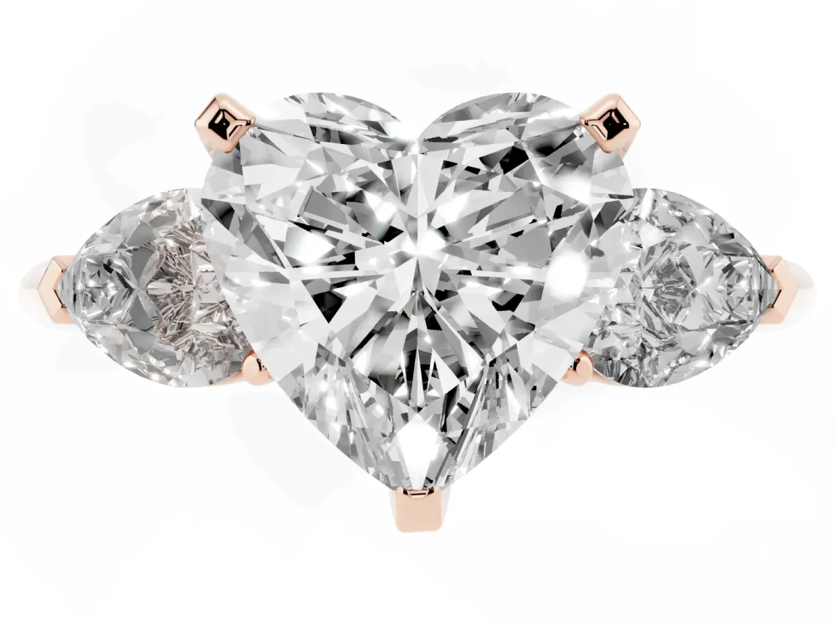 Three-Stone Heart Cut Diamond Ring with Pear Side Stones and Four-Prong Setting Rose gold