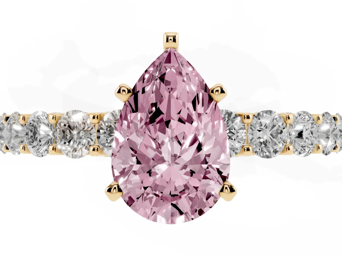 Fancy Pink Pear Cut Diamond Solitaire Ring with Shared Prong Pavé Band and Four-Prong Setting Yellow gold