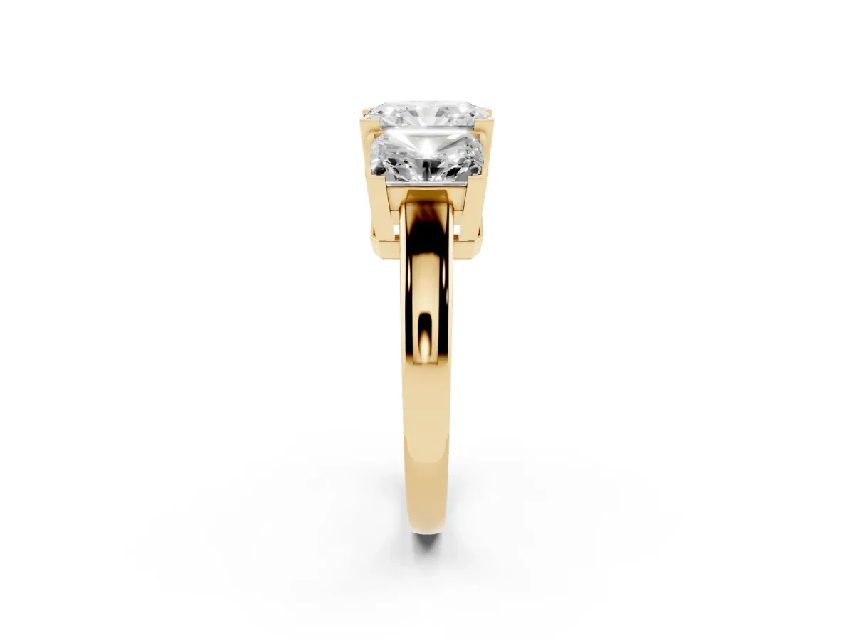 Three-Stone Radiant Cut Cut Diamond Ring with Channel Set Band and Four-Prong Setting Yellow gold