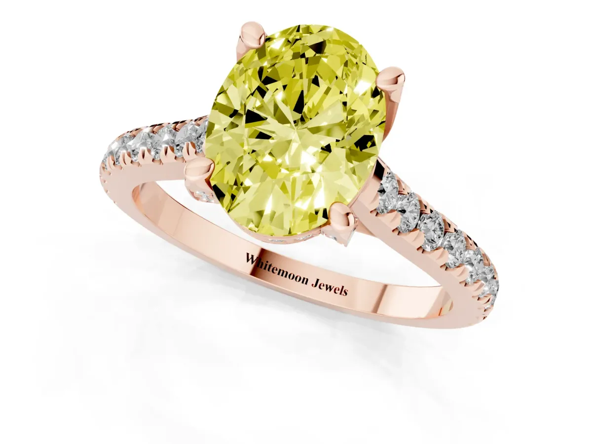 Fancy Yellow Oval Cut Brilliant Diamond Solitaire with Pavé Band and Four-Prong Setting Rose gold
