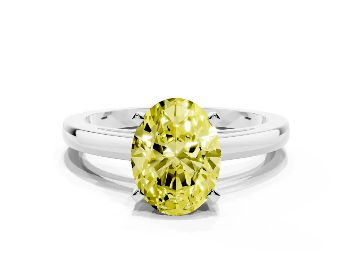 Fancy Yellow Oval Cut Solitaire Diamond Engagement Ring with Four-Prong Setting on a Classic Band Silver