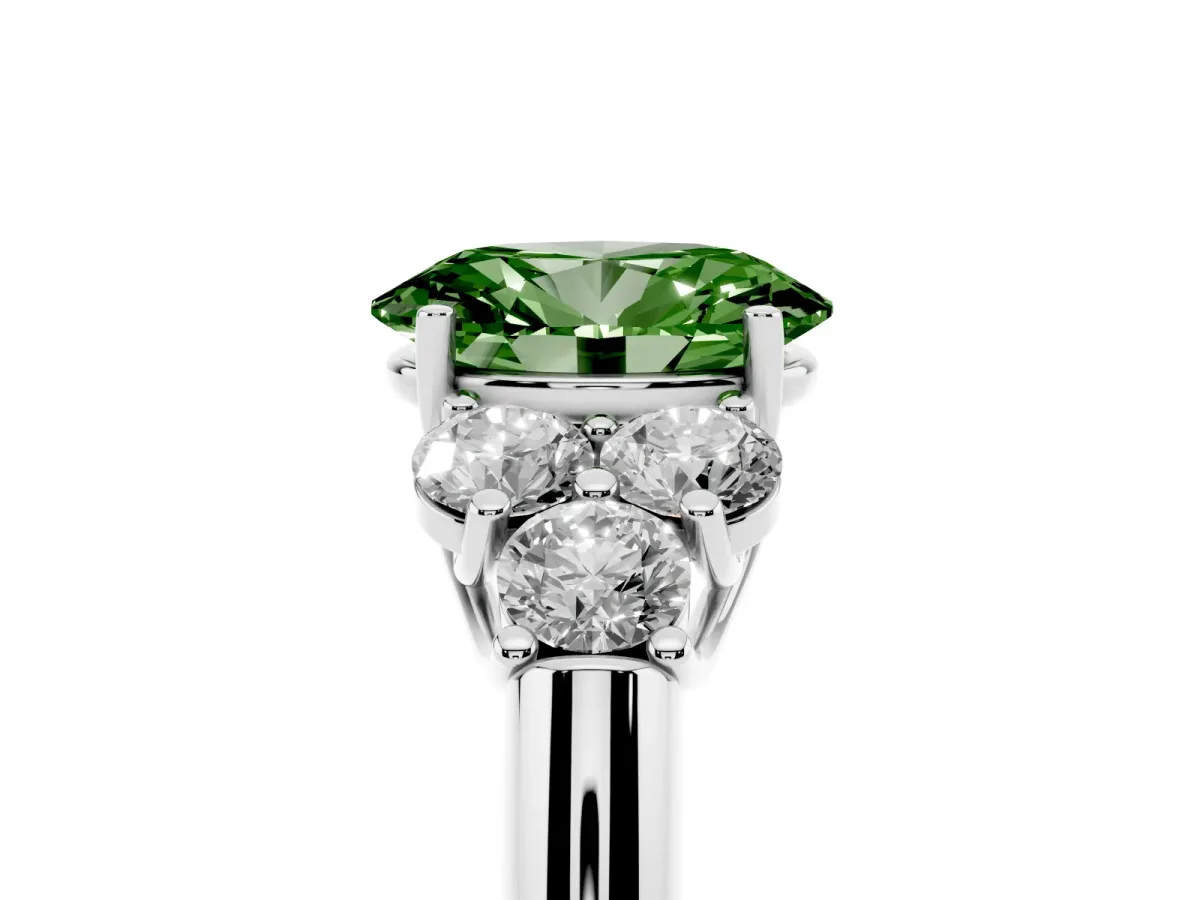 Fancy Green Oval Cut Cut Diamond Cluster Ring with Round Accent Stones and Prong Setting on a Classic Band White gold