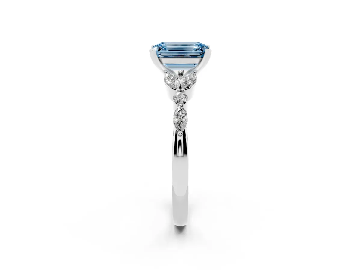 Fancy Blue Emerald Cut Diamond Solitaire Ring with Side Stones and Four-Prong Setting Platinum