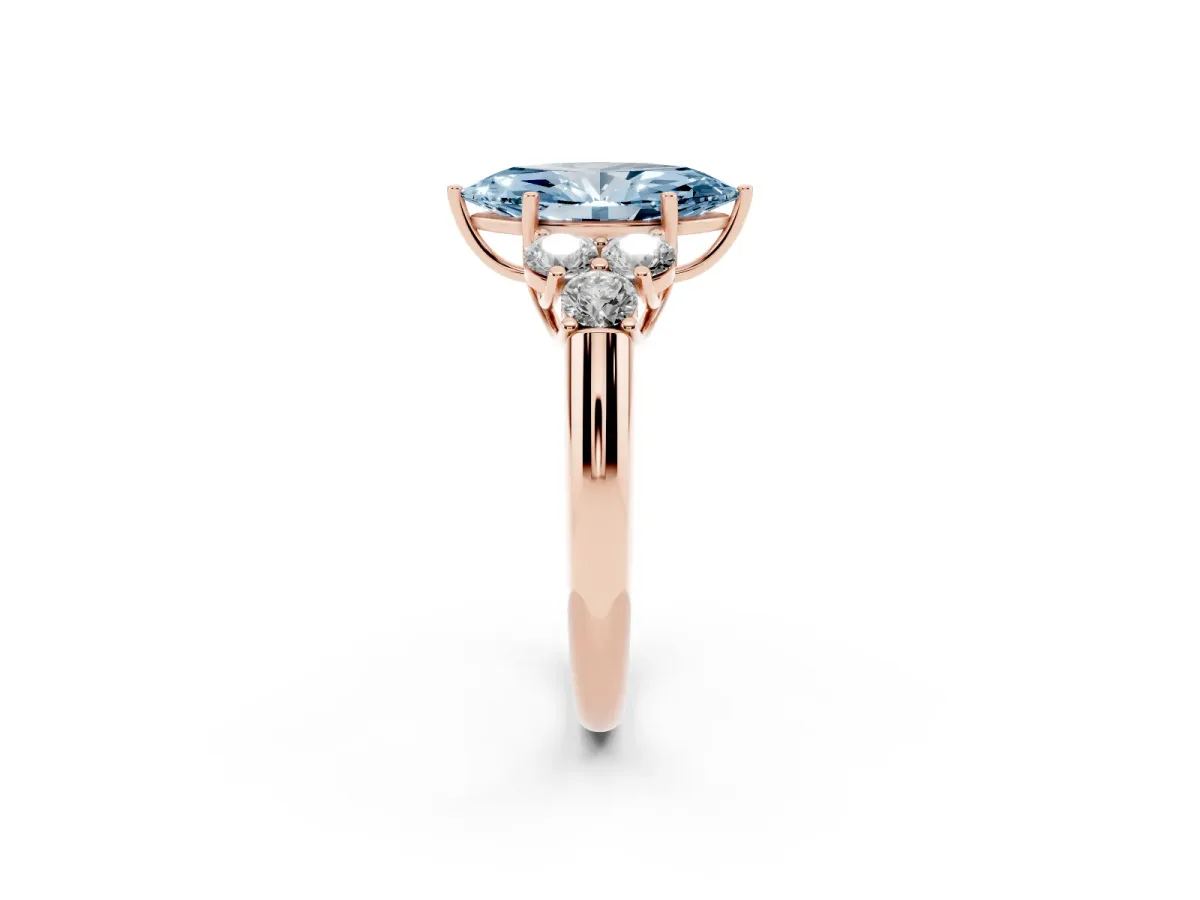 Fancy Blue Marquise Cut Cut Diamond Cluster Ring with Round Accent Stones and Prong Setting on a Classic Band Rose gold