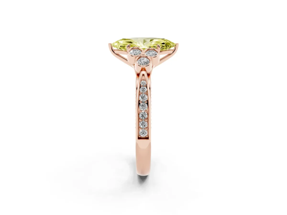 Fancy Yellow Marquise Cut Cut Diamond Engagement Ring with Bezel Set Round Side Stones and Prong Setting Rose gold