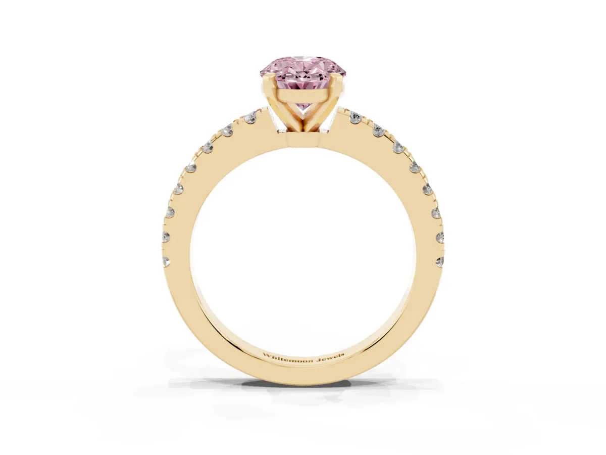 Fancy Pink Oval Cut Solitaire Diamond with Pavé Band and Four-Prong Setting Yellow gold