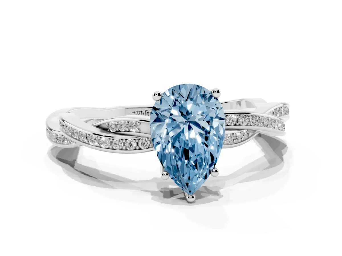 Fancy Blue Pear Cut Solitaire Twisted Pave Diamond Ring with Four-Prong Setting Silver
