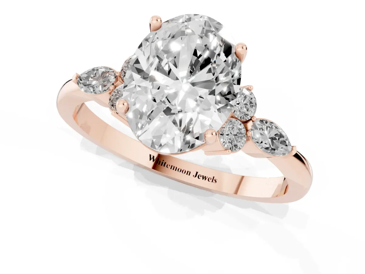 Oval Cut Brilliant Diamond Solitaire Ring with Pear Side Stones and Four-Prong Setting Rose gold