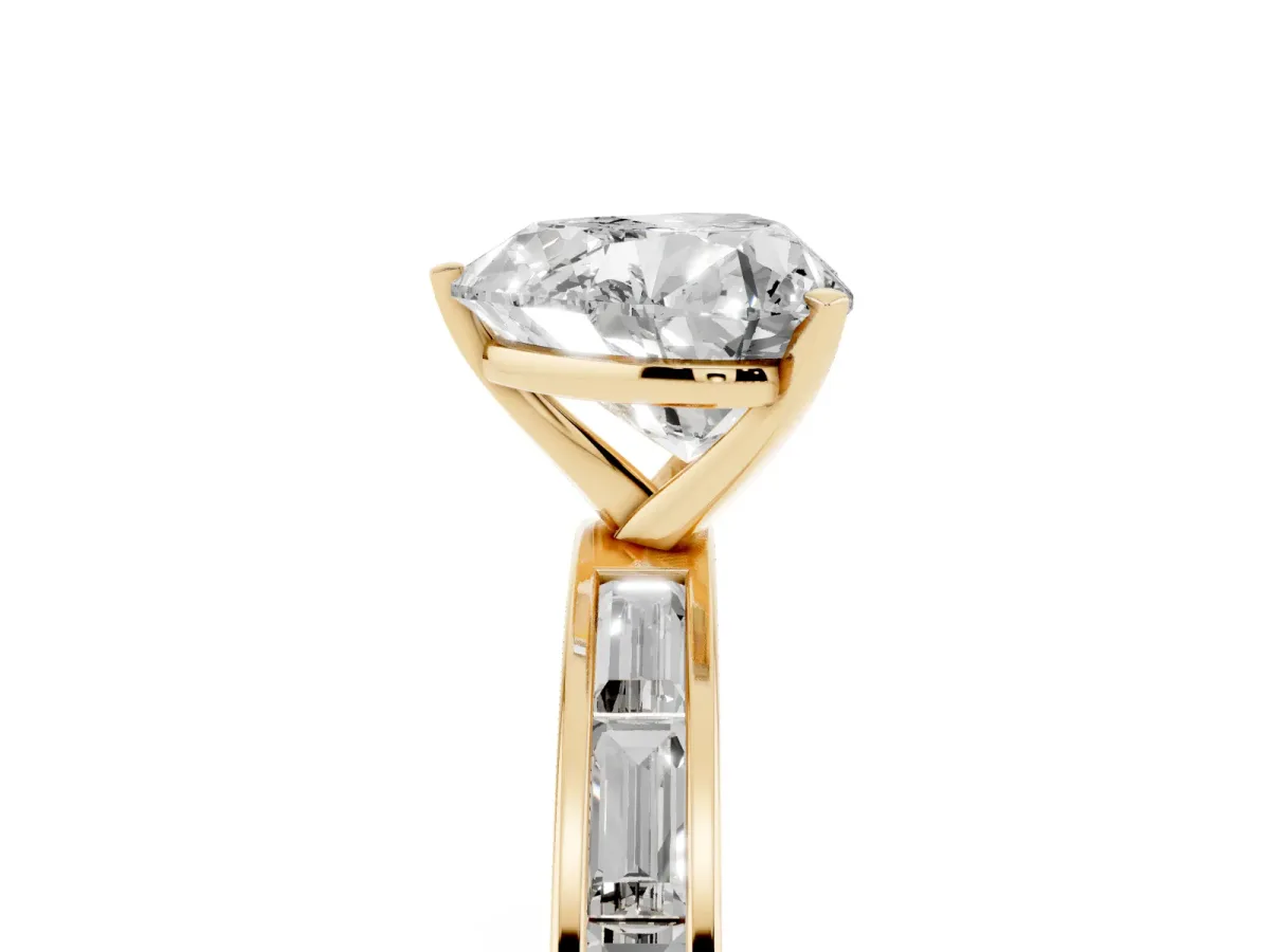 Heart Cut Solitaire Diamond Ring with Channel-Set Baguette Band and Four-Prong Setting Yellow gold