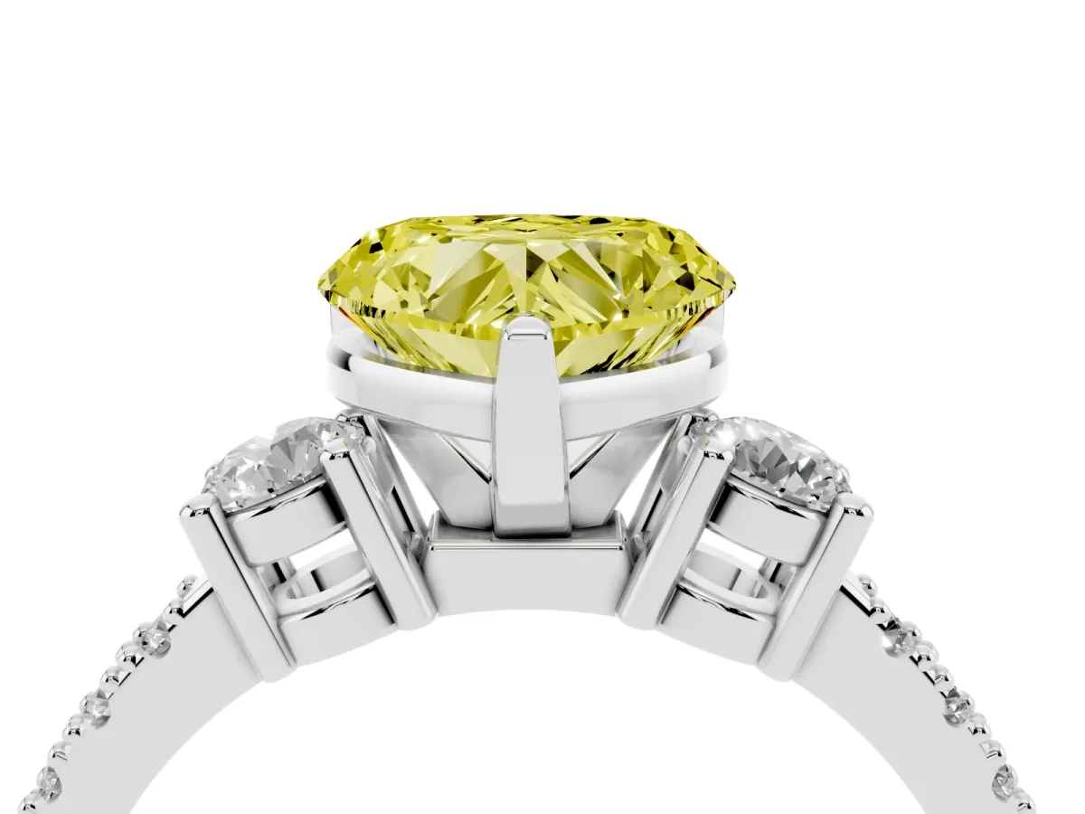 Fancy Yellow Heart Cut Three-Stone Diamond Pavé Band with Prong Setting Platinum
