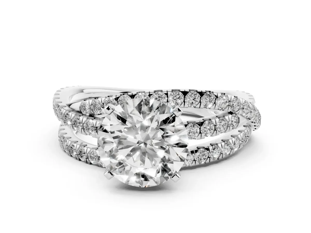 Round Cut Solitaire Twist Band with Pavé Setting and Four-Prong Setting Silver