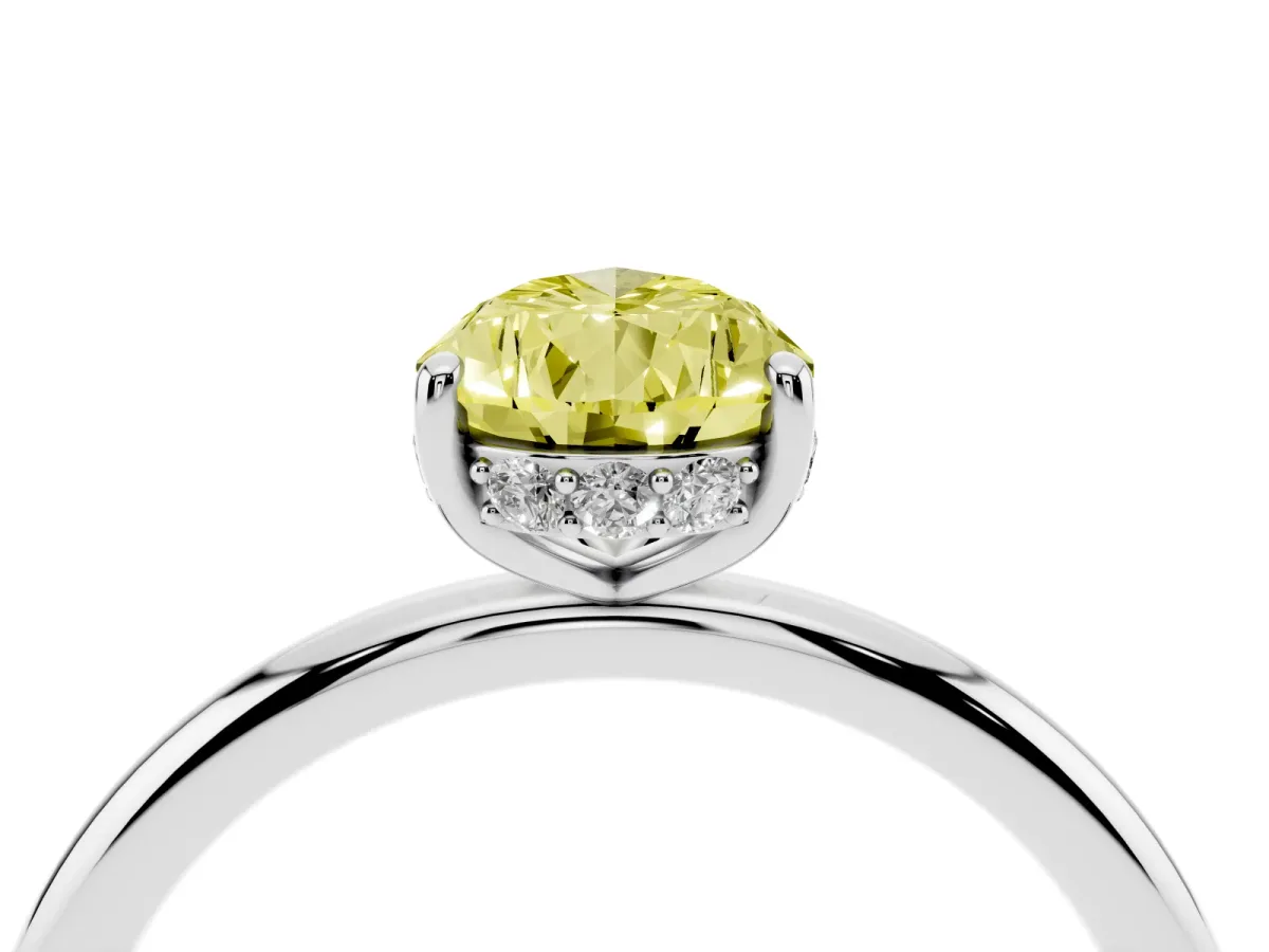 Fancy Yellow Pear Cut Solitaire Diamond Ring with a Classic Band and Four-Prong Setting Silver