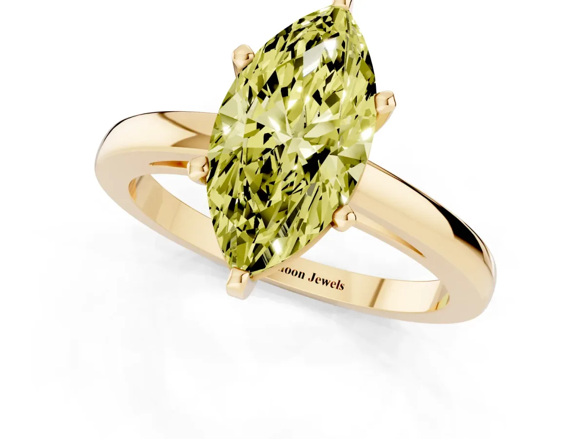 Fancy Yellow Marquise Cut Solitaire Diamond Engagement Ring with Four-Prong Setting on a Classic Band Yellow gold