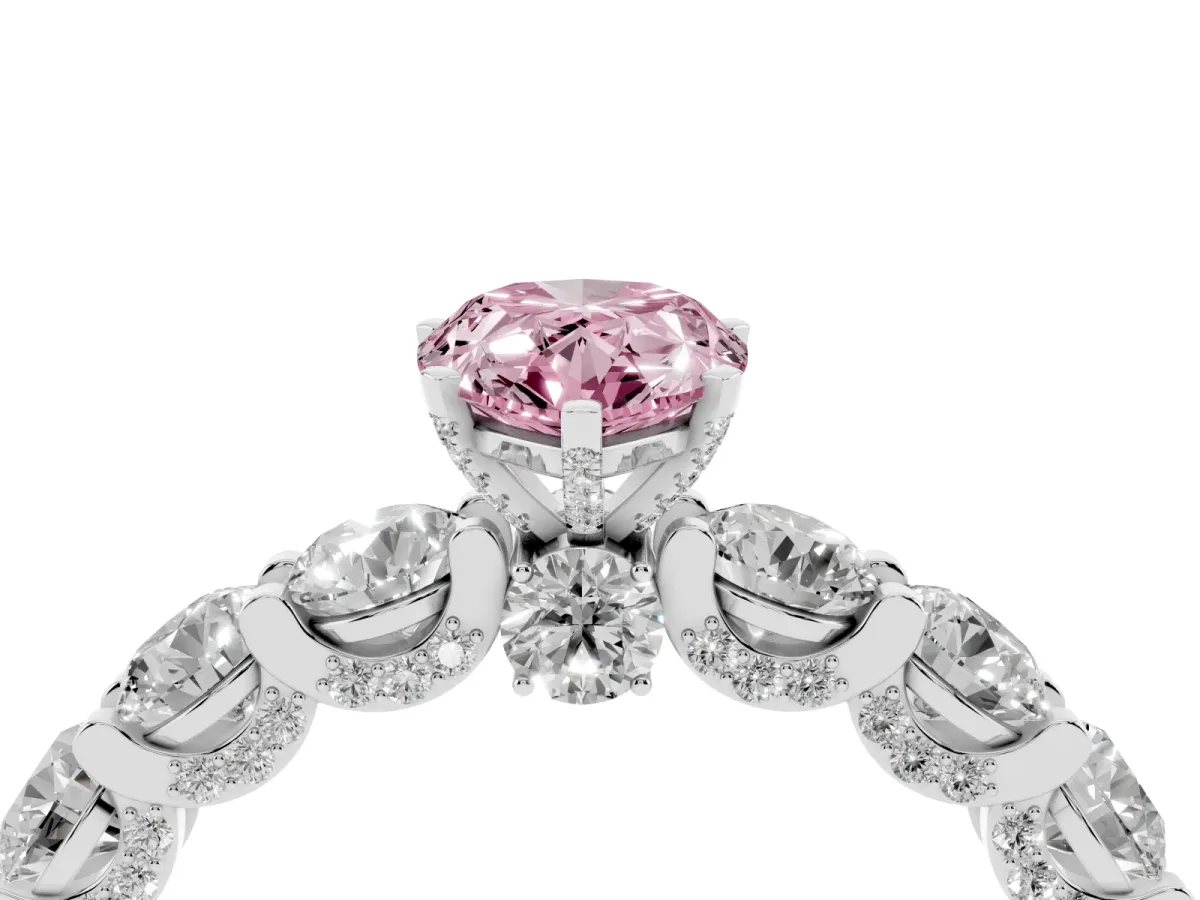 Fancy Pink Pear Cut Diamond Side Stone Engagement Ring with Four-Prong Setting Platinum