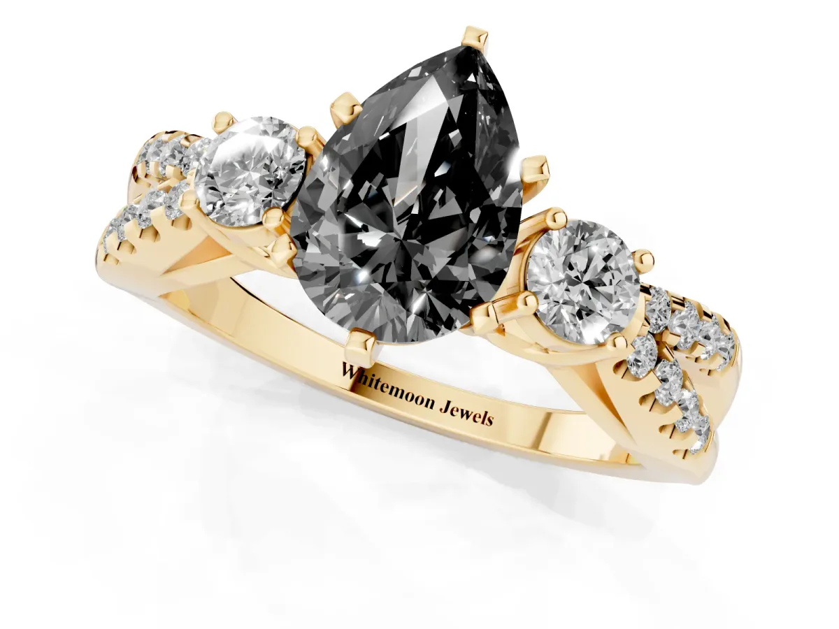 Fancy Black Pear Cut Diamond Three-Stone Ring with Pavé Split Shank and Four-Prong Setting Yellow gold