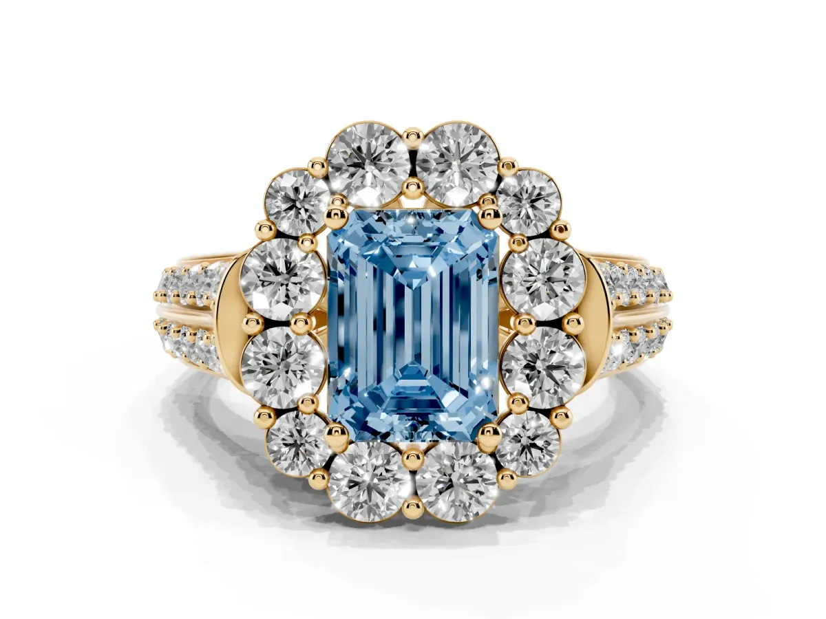 Fancy Blue Emerald Cut Halo Diamond Engagement Ring with Split Shank and Prong Setting Yellow gold