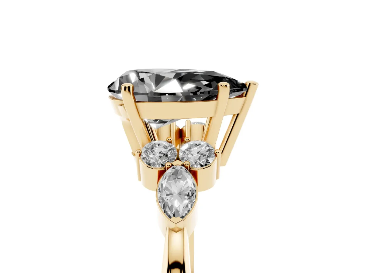 Fancy Black Pear Cut Brilliant Diamond Solitaire Ring with Pear Side Stones and Four-Prong Setting Yellow gold
