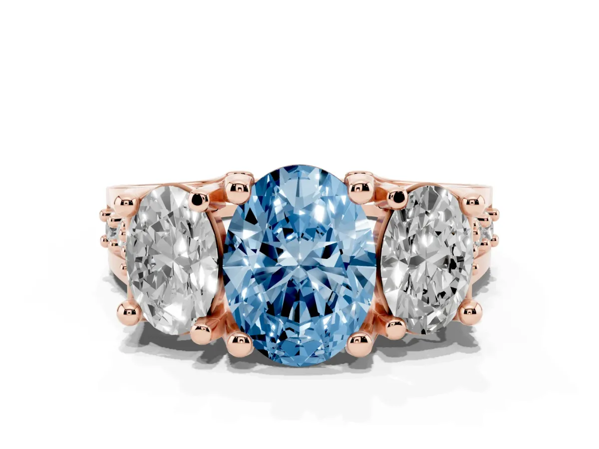 Fancy Blue Oval Cut Diamond Three-Stone Ring with Channel Set Band and Four-Prong Setting Rose gold