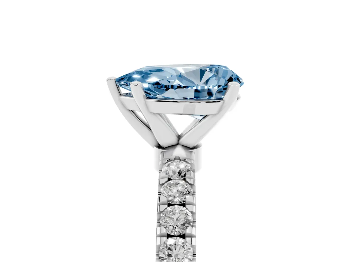 Fancy Blue Pear Cut Diamond Solitaire Ring with Pavé Accents and Four-Prong Setting Platinum