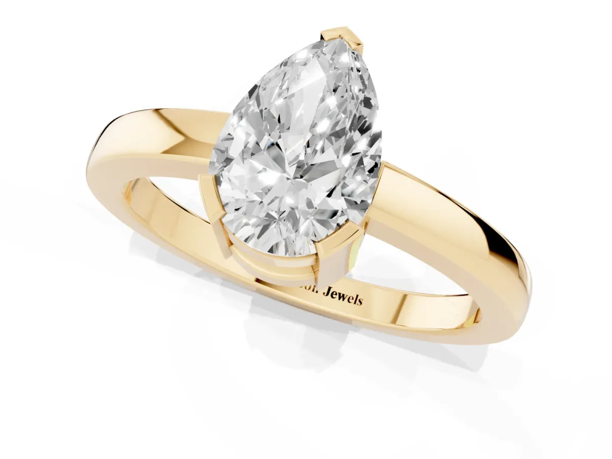 Pear Cut Cut Solitaire Ring with Four-Prong Setting and Classic Band Yellow gold
