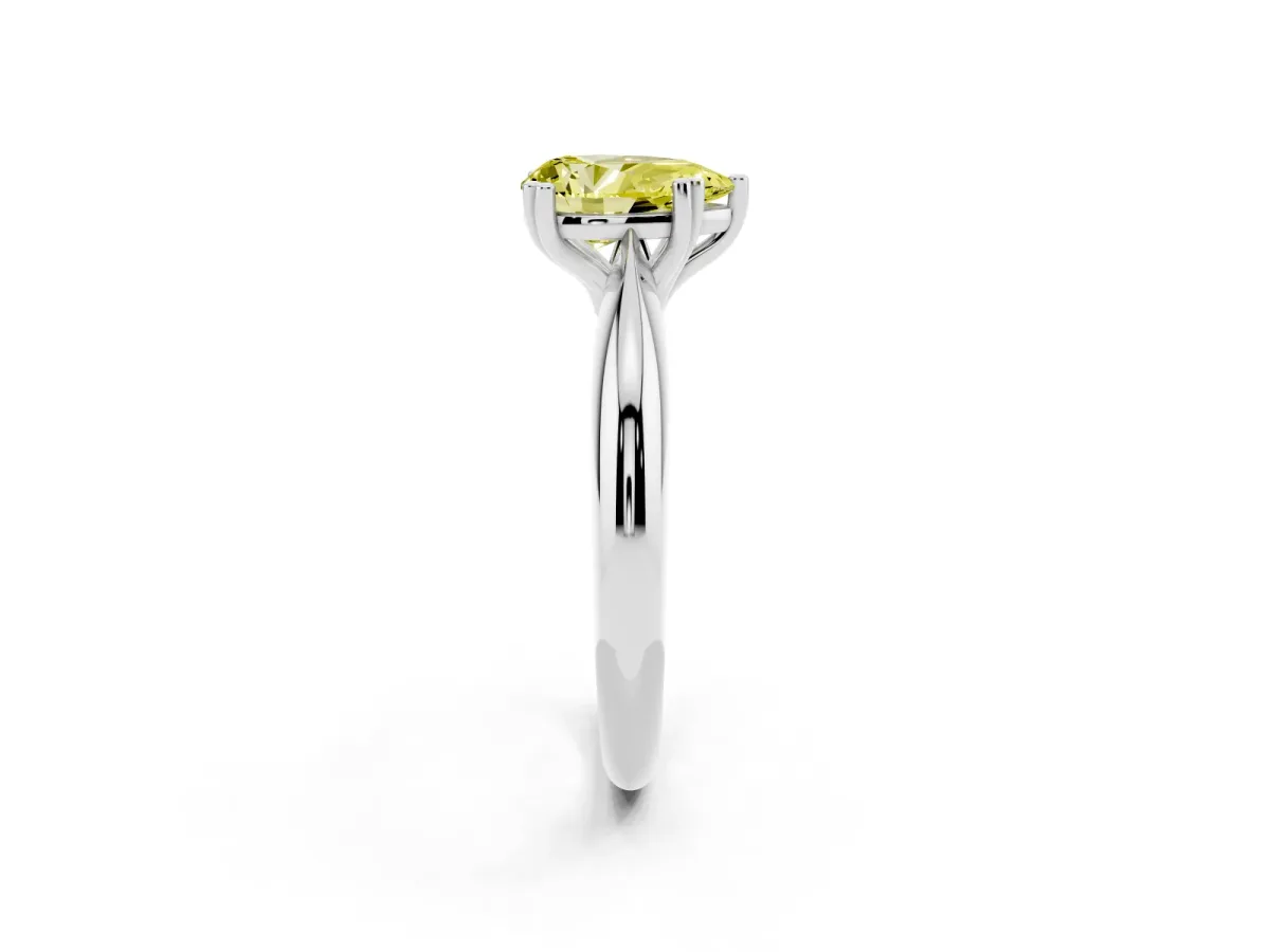 Fancy Yellow Pear Cut Cut Solitaire Engagement Ring with Tapered Band and Four-Prong Setting Silver