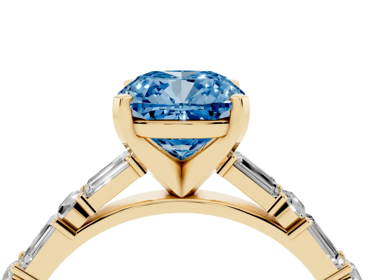 Fancy Blue Cushion Cut Diamond Solitaire with Side Baguettes and Channel Set Band Yellow gold