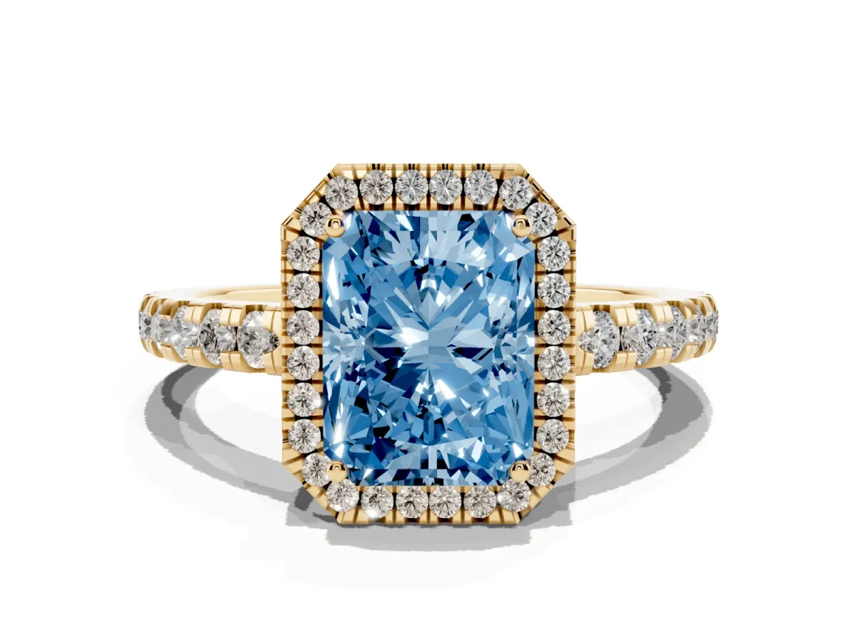 Fancy Blue Radiant Cut Diamond Halo Ring with Pavé Band and Four-Prong Setting Yellow gold